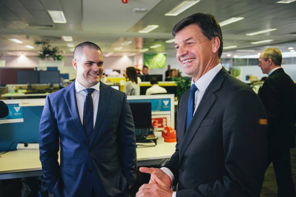 Assistant Minister for Cities and Digital Transformation, Angus Taylor, pictured with Veritec CEO Keiran Mott, pushed through reforms to the government's IT agenda. Photo: Rohan Thomson