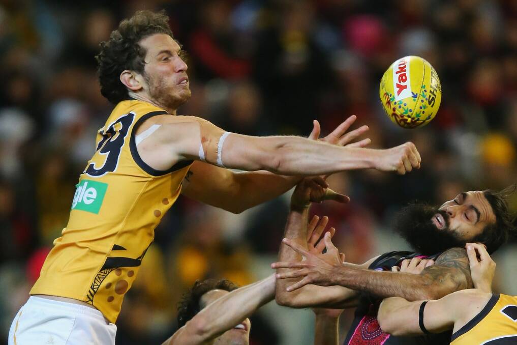 MELBOURNE, AUSTRALIA - MAY 28:  Tyrone Vickery of the Tigers punches the ball away from Courtenay Dempsey of the Bombers during the round 10 AFL match between the Essendon Bombers and the Richmond Tigers at Melbourne Cricket Ground on May 28, 2016 in Melbourne, Australia.  (Photo by Michael Dodge/Getty Images) Photo: Michael Dodge