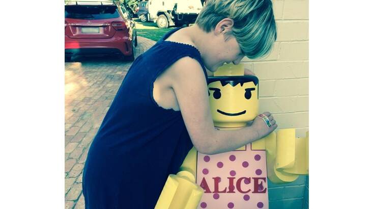 Charlie Bigg-Wither's daughter, Alison, and her Lego statue. Photo: Charlie Bigg-Wither