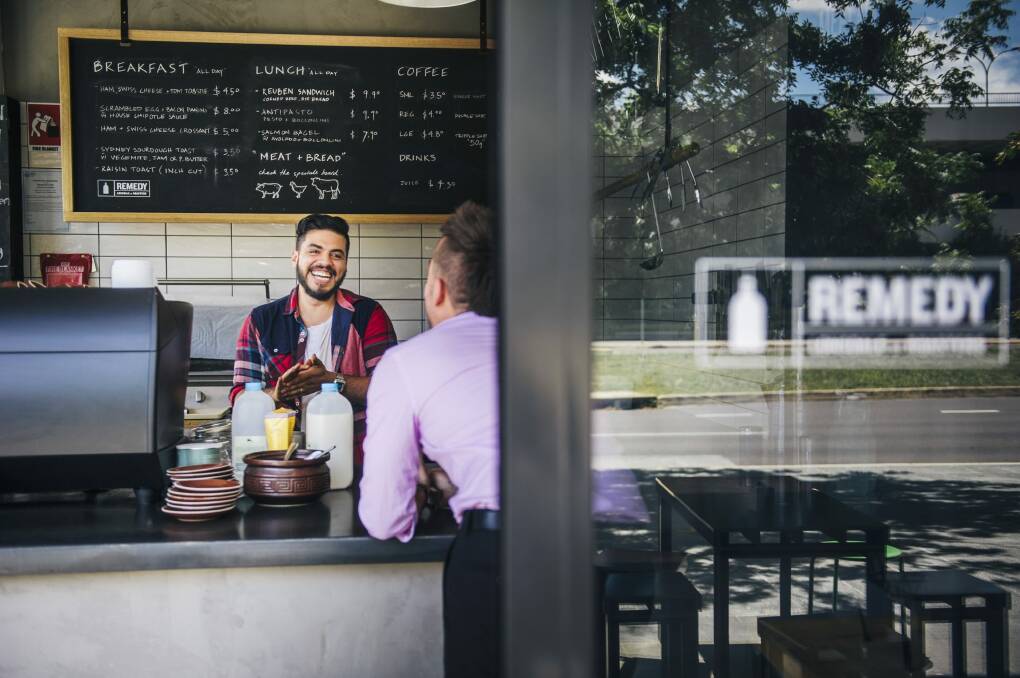Canberra public servants are likely to spend about $45 each working day in shops and cafes, like Belconnen's Remedy, co-owned by Moey Khodr. Photo: Rohan Thomson