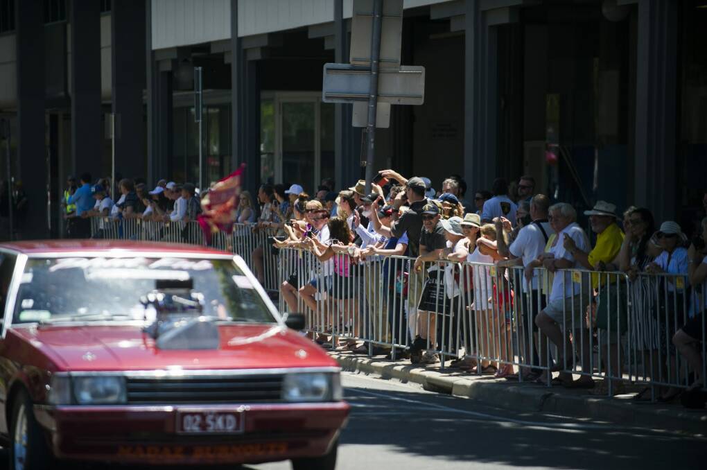 The Summernats City Cruise passes the crowd in Northbourne Avenue. 

 Photo: Rohan Thomson 
