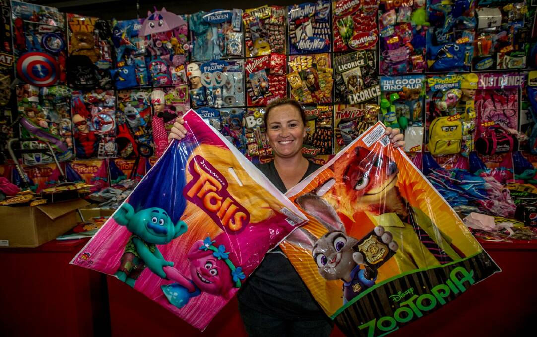Showbag seller from Parkes, Megan Brown with two of her most popular bags. Trolls and Zootopia. Photo: Karleen Minney