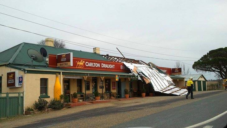 Reader Karen Jones sent in this picture of the Bredbo Inn Hotel this on Friday morning, which had its roof blown off. Photo: Karen Jones