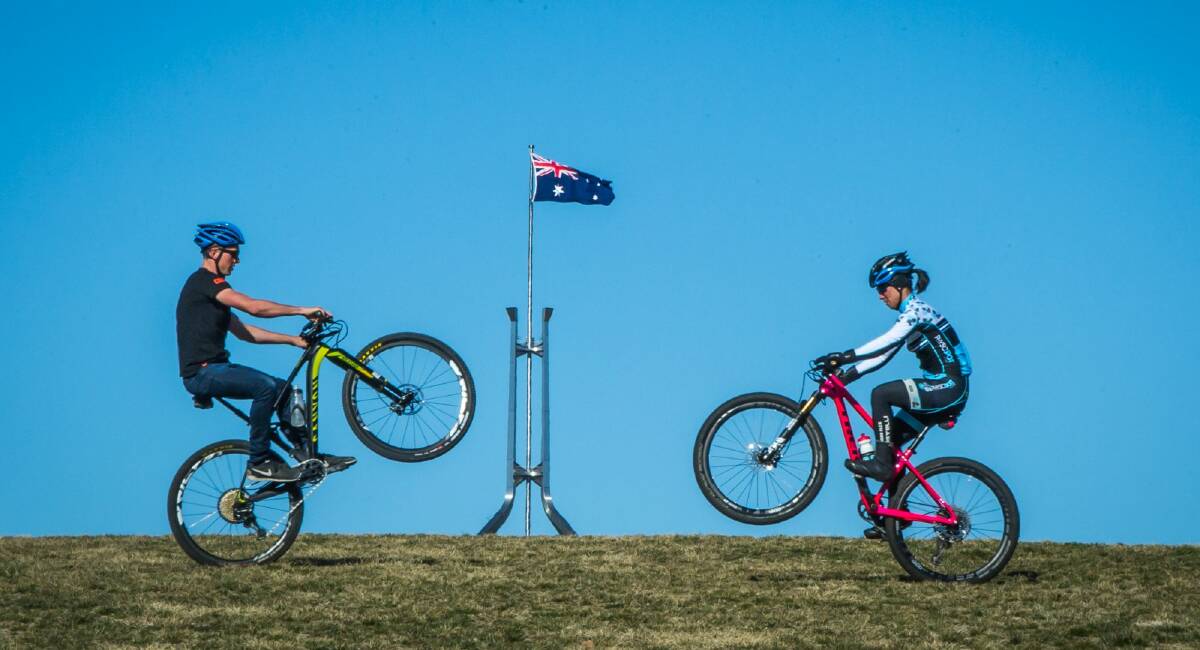 Canberra mountain bike riders Mark Tupalski (left) and Eliza Kwan. Photo: Karleen Minney