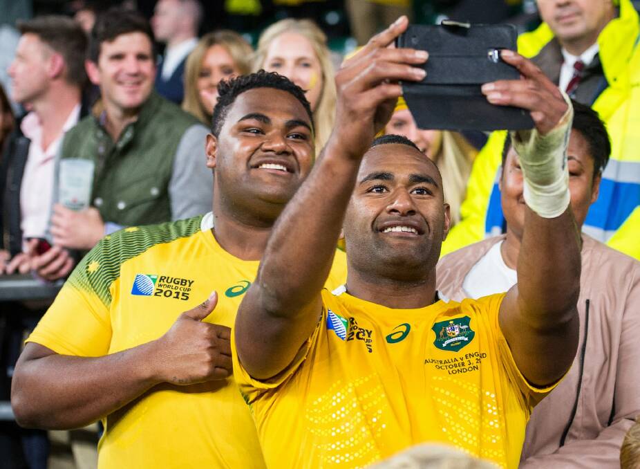 In the picture: Tevita Kuridrani takes for a selfie with a lucky fan after the win against England. Photo: Stuart Walmsley