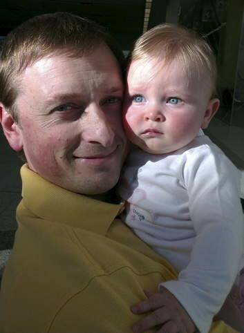 Canberra Dads organiser Rick Bollard with his nearly seven-month-old daughter Eleanor.