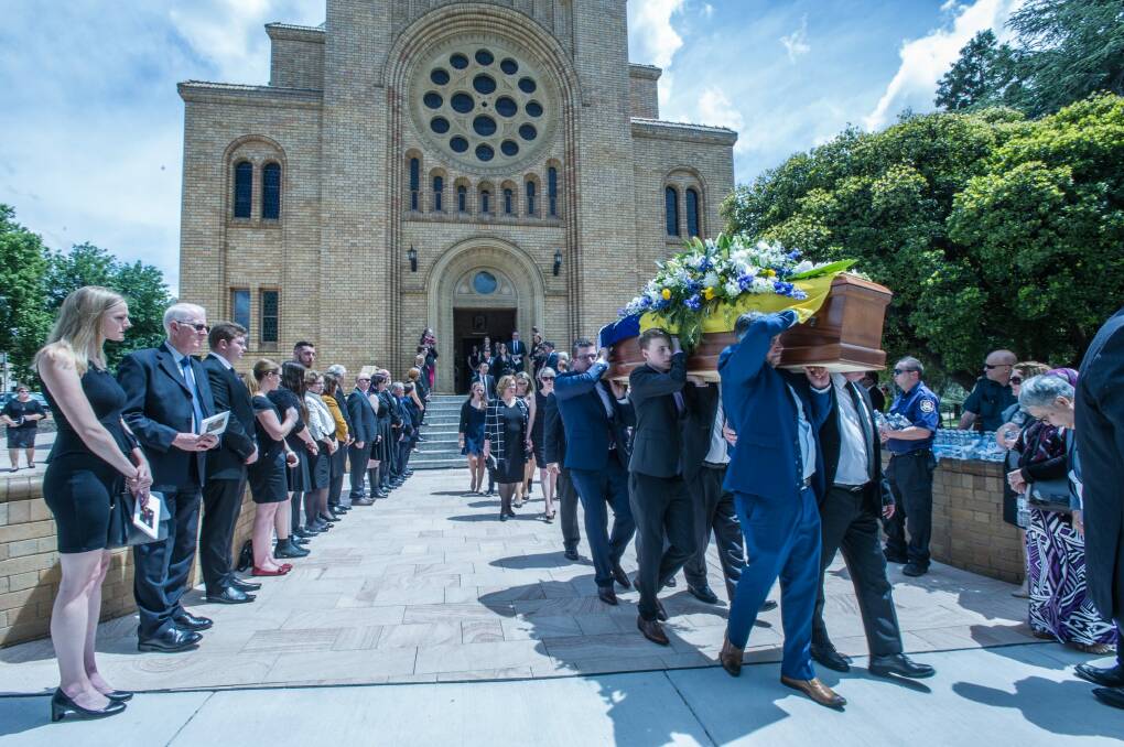 A guard of honour at the door of St Christopher's Cathedral for Steve Doszpot.  Photo: Karleen Minney