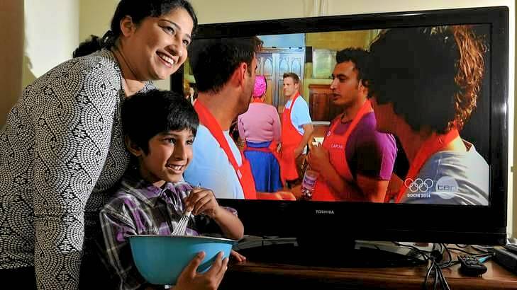 Rishi Desai's wife Mitra and six-year-old son Sharang enjoyed watching his <i>MasterChef</i> journey from their Queanbeyan living room. Photo: Graham Tidy