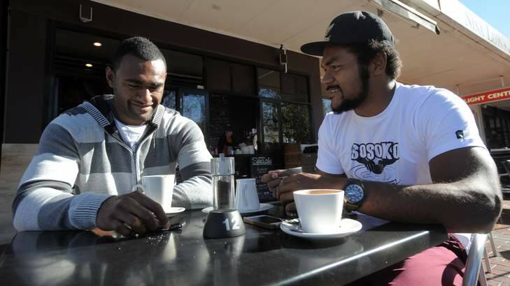 Fijian-born Brumbies players, Tevita Kuridrani, left, and Henry Speight, share some time together over a coffee at Kingston. Photo: Graham Tidy