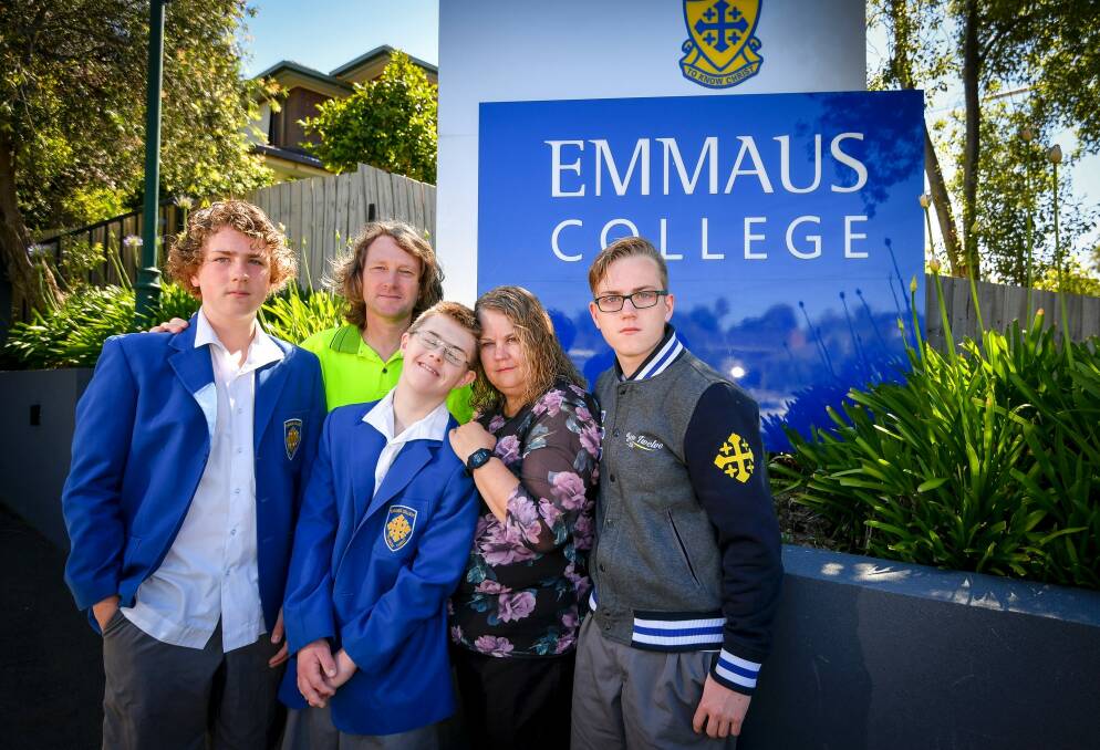 Fees at Emmaus College in Vermont South will rise 7.5 per cent next year, upsetting Cameron and Catherine McAlpine and their three sons, Leigh, Julian and Aaron. Photo: Eddie Jim