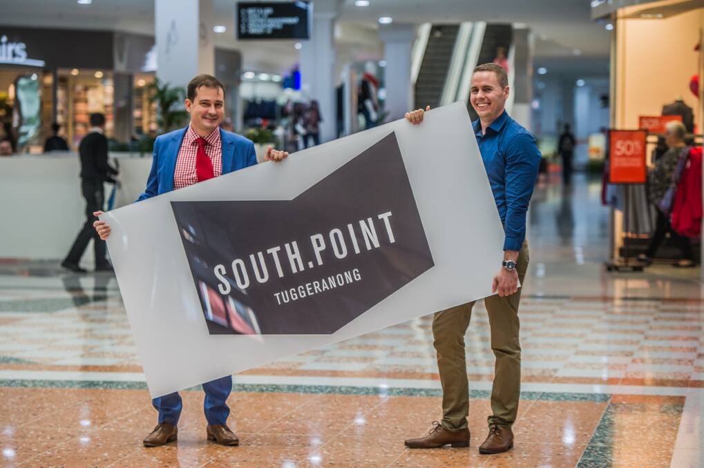 Centre manager Jeremy Wilson and marketing manager Adam Gill with the new South.Port sign at the former Hyperdome.  Photo: Karleen Minney