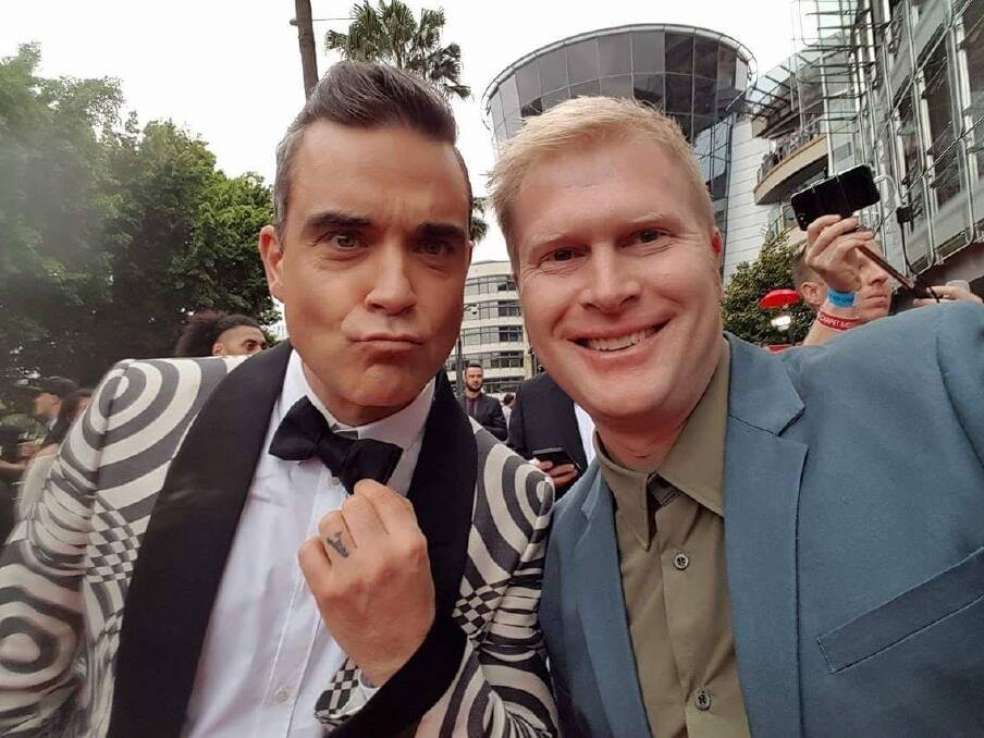Canberra developer Bill O'Neill sidestepped security to get a selfie with mega-star Robbie Williams at the ARIAs. Photo: Supplied