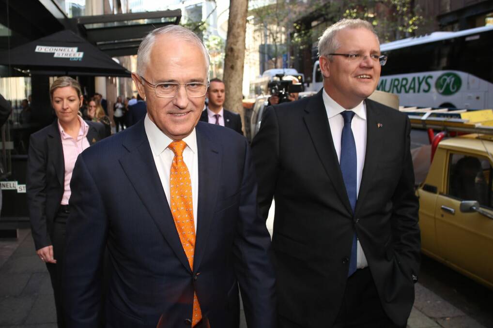 Prime Minister Malcolm Turnbull, pictured with Treasurer Scott Morrison, said his party would preference Labor ahead of the Greens. Photo: Andrew Meares