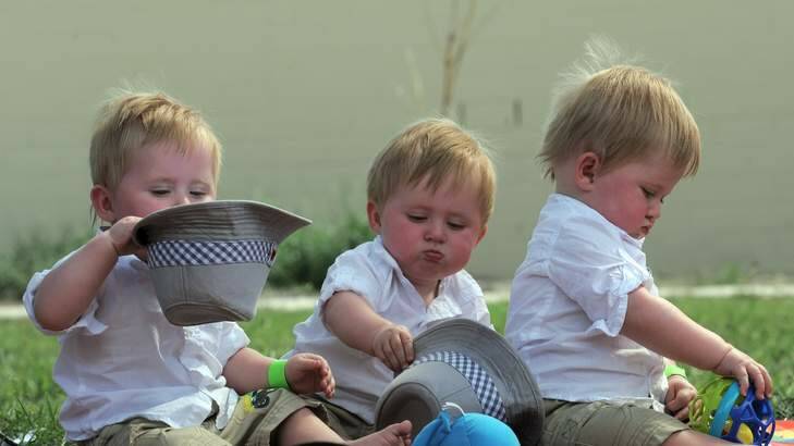 Triplets from Bombala, 11 month old Liam Guthrie, left, with his brothers, Kobi, centre and Nash, right. Photo: Graham Tidy