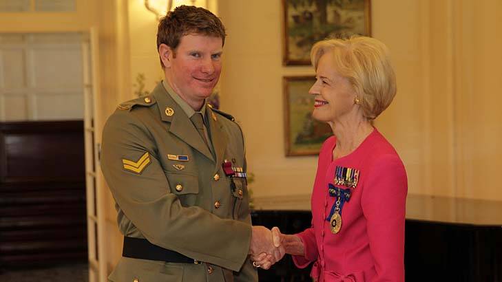 Governor-General Quentin Bryce presents Corporal Keighran with the Victoria Cross. Photo: Andrew Meares
