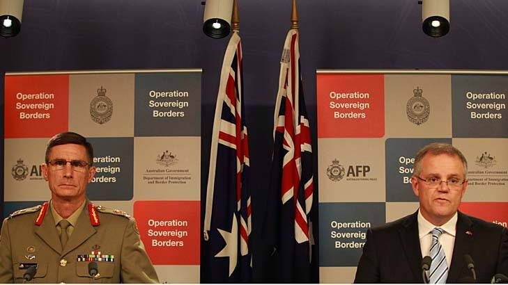 Immigration Minister Scott Morrisson, pictured with Lieutenant General Angus Campbell at a briefing, says he'll no longer hold the weekly press conferences. Photo: Jacky Ghossein