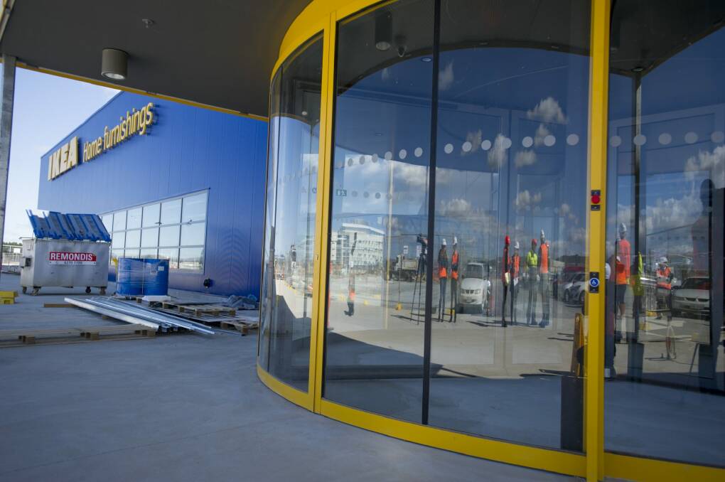 The store's airlock revolving doors will help control temperatures in the energy-efficient building. Photo: Jay Cronan