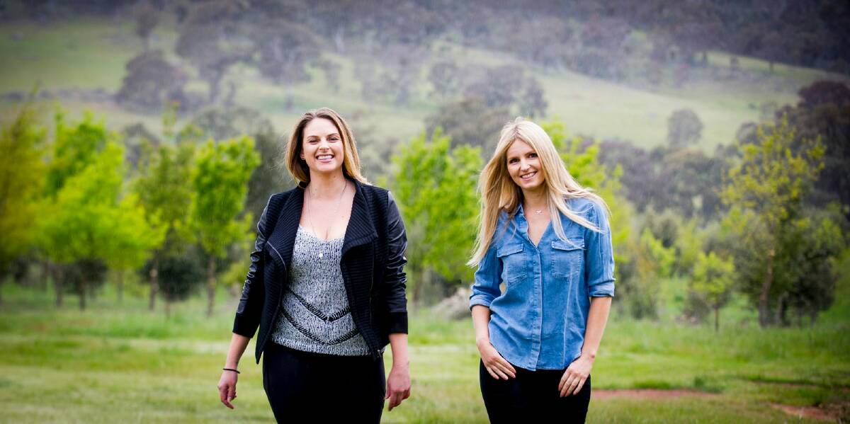 Ali King (right) with business partner Emile Rohan at The Truffle Farm off Majura Road in Canberra. Part of their business will include hosting high tea-style events at the farm. Photo: Elesa Kurtz