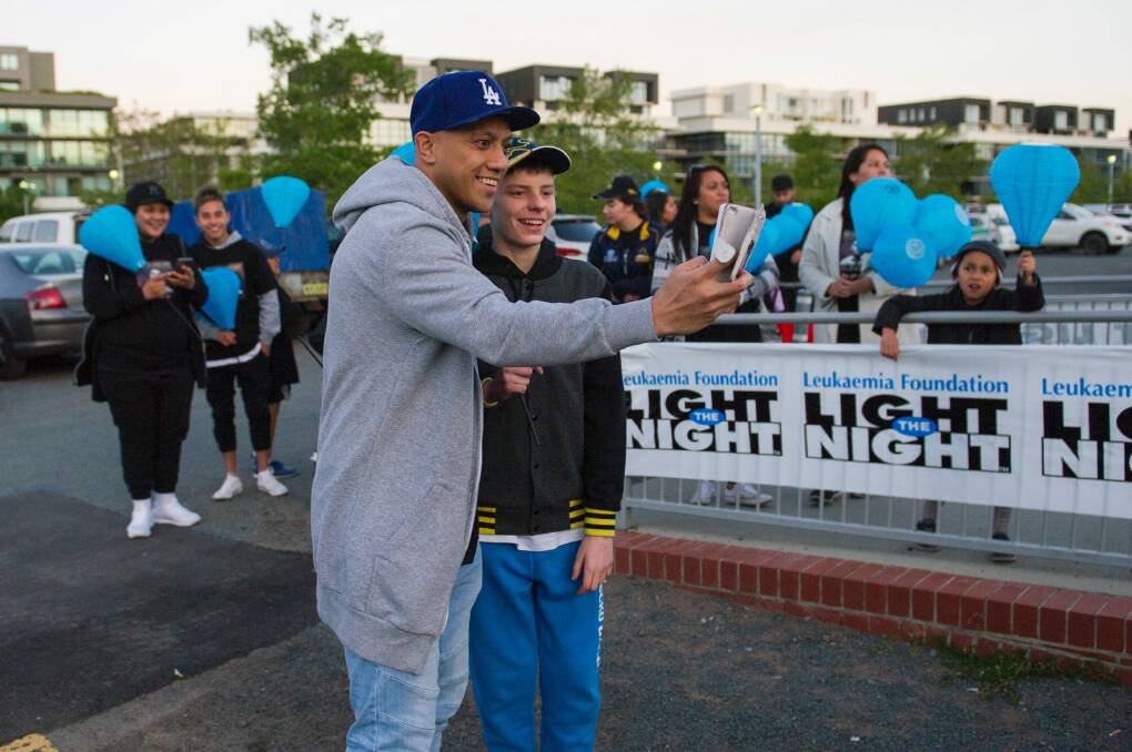 Christian Lealiifano rallies around friends family and the 1000s of supporters at the Canberra Leukaemia Foundation Light the Night walk to help more Australians beat blood cancer through research and support Photo Jay Cronan Photo: Jay Cronan