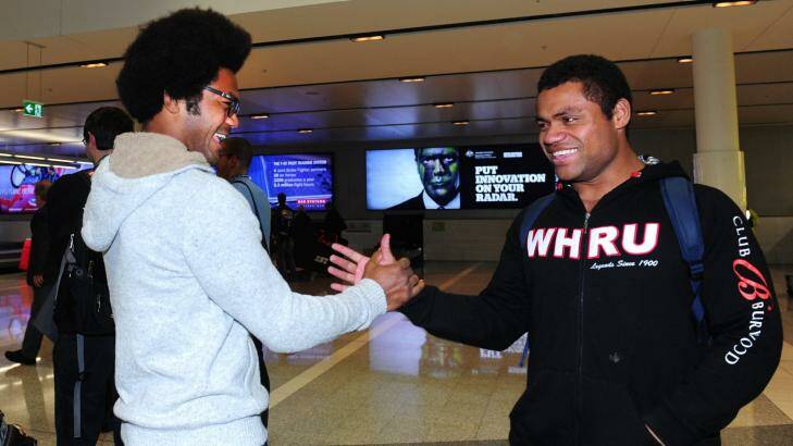 Henry Speight greets his brother Sam at Canberra Airport on Wednesday. Photo: Melissa Adams