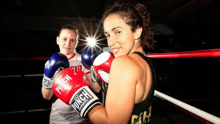 Canberra boxer Bianca Elmir, right, training with Russian women's world champion Alexandra Kuleshova. Photo: Katherine Griffiths