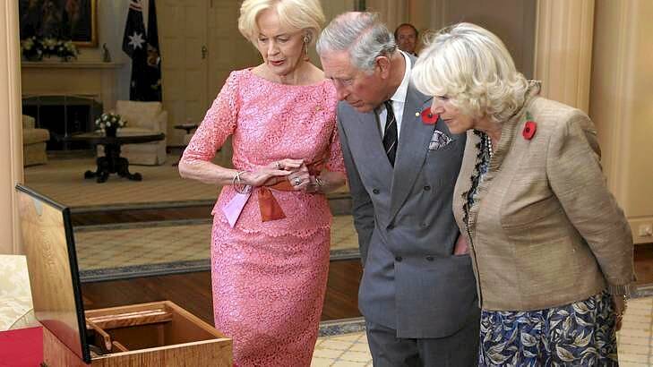 The Governor-General Quentin Bryce, Britain's Prince Charles and Camilla, Duchess of Cornwall inspect a gift, a writing compendium, to be presented to Britain's Queen Elizabeth to mark her Diamond Jubilee. Photo: Reuters