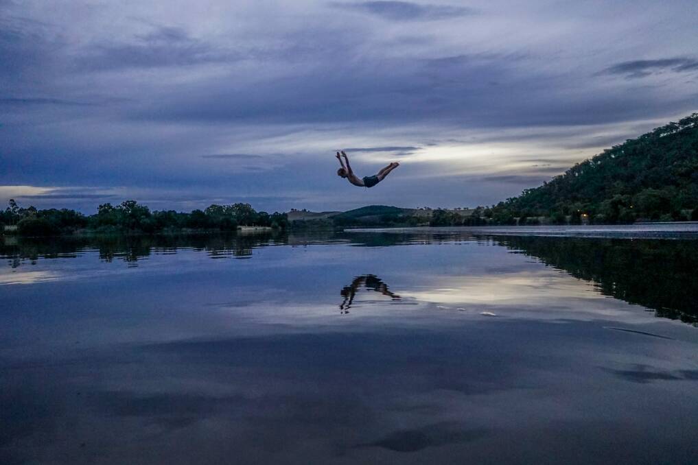 Max Lee-Abbott (pictured) and photographer Gerard Kennedy recently swam in Lake Burley Griffin for the first time since their childhood and said it was pleasant despite its reputation as unsafe and "gross". Photo: Gerard Kennedy