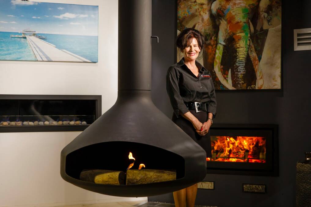 Owner of Burning Log Indoor Outdoor Natalie Carey says interest in woodfire heaters is only increasing. Photo: Sitthixay Ditthavong