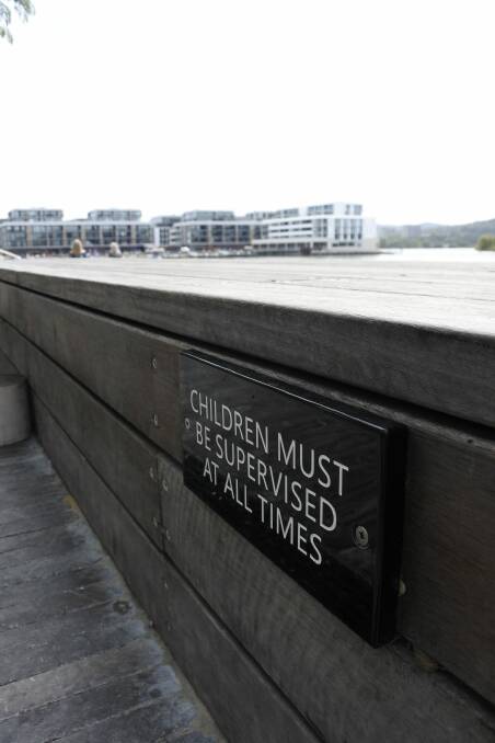 These signs are dotted along the Kingston Foreshore restaurant precinct. Photo: Megan Doherty