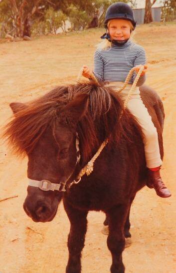 Megan Jones with her first pony, Ebony. Photo: Peter Jones