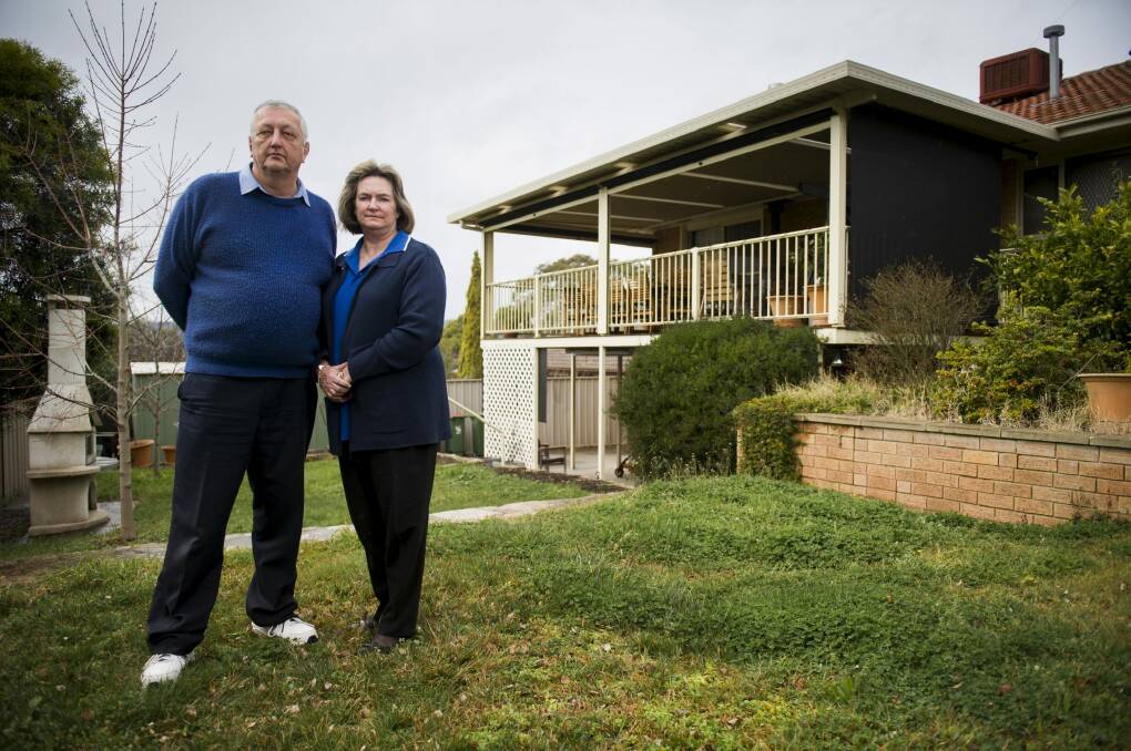 Mike and Maryanne Bresnik outside their Mr Fluffy home in Queanbeyan. Photo: Rohan Thomson