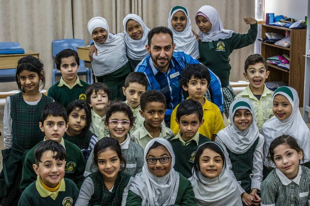 It's business as usual for Islamic School of Canberra teacher Kayis Ablahd and his year 2 pupils. Photo: Karleen Minney
