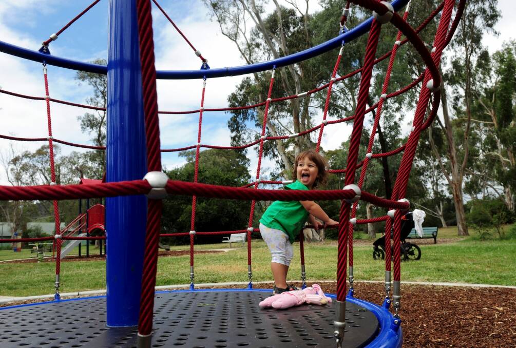 Local resident, 20-month-old Cassidy Rando, enjoys the new equipment. Photo: Graham Tidy