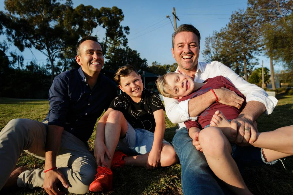 Simon Duffy and his partner Wally say it is impossible to explain to their sons why they can't get married in Australia.  Photo: Brook Mitchell