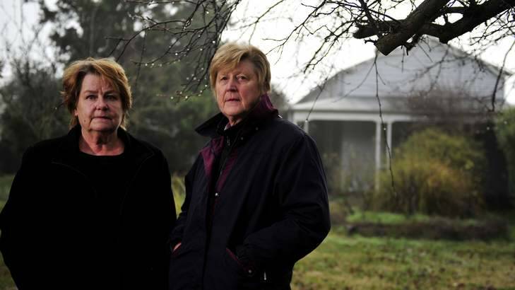 Kaarina Vauhkonen and Pirkko Nieminen  standing in front of their former Bungendore house. Photo: Jay Cronan
