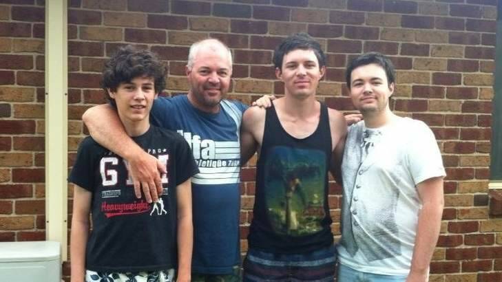 Lachlan, Joshua, Hayden Vandenberg with their father Kane, who died in a cycling accident on Friday at Mount Stromlo. Photo: Supplied