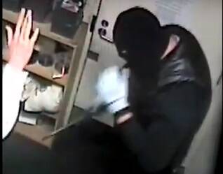 A still image from the footage of Mawson Club armed robbery on August 8, 2016 Photo: Supplied