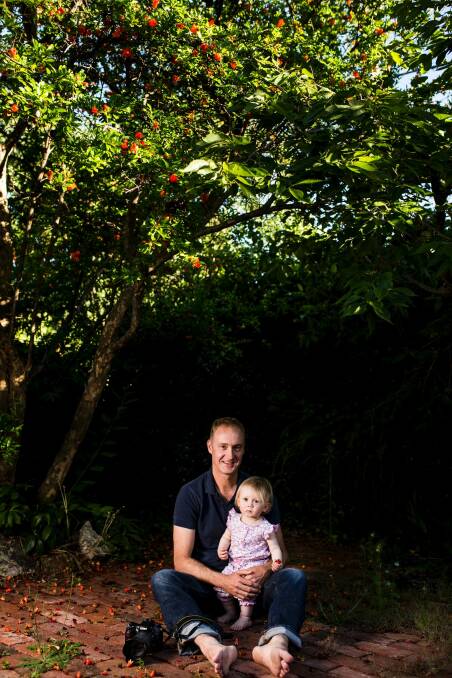 Winner of the Canberra Times Spring 2016 photo competition, James Crook, with his 15-month daughter Lara. Photo: Jamila Toderas