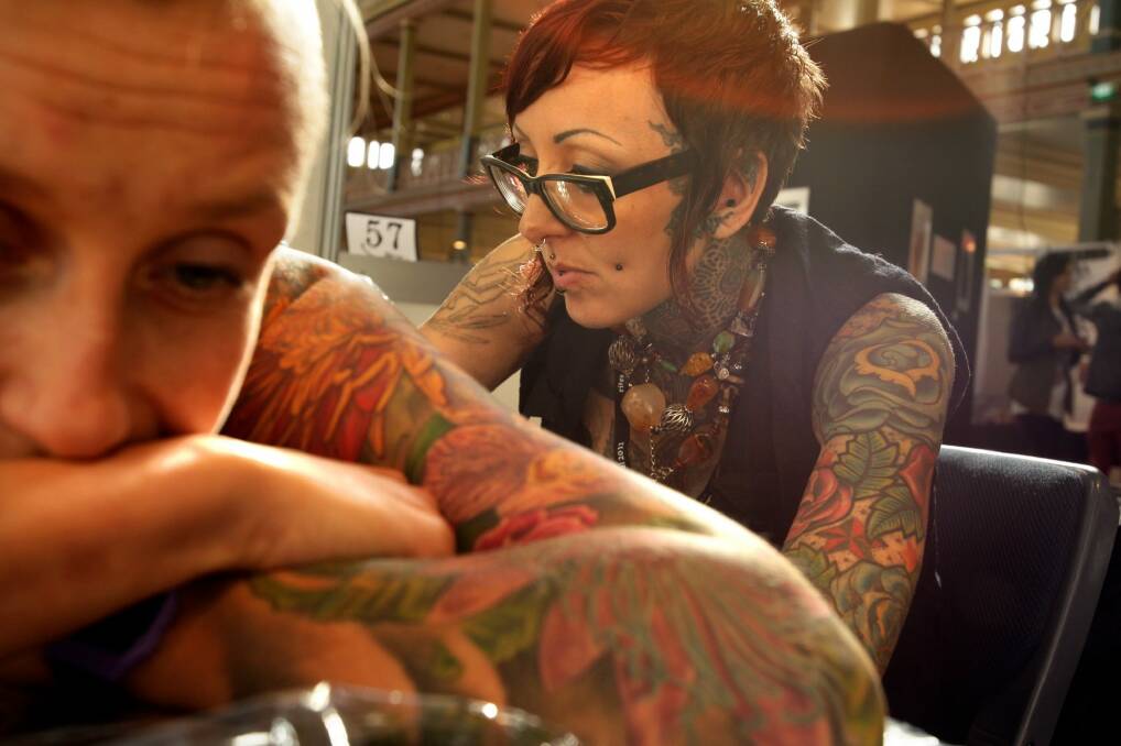 Not-so-secret ink: British spy agency MI5 has joined other employers, including some Australian police forces, in avoiding recruits with visible tattoos. Photo: Angela Wylie