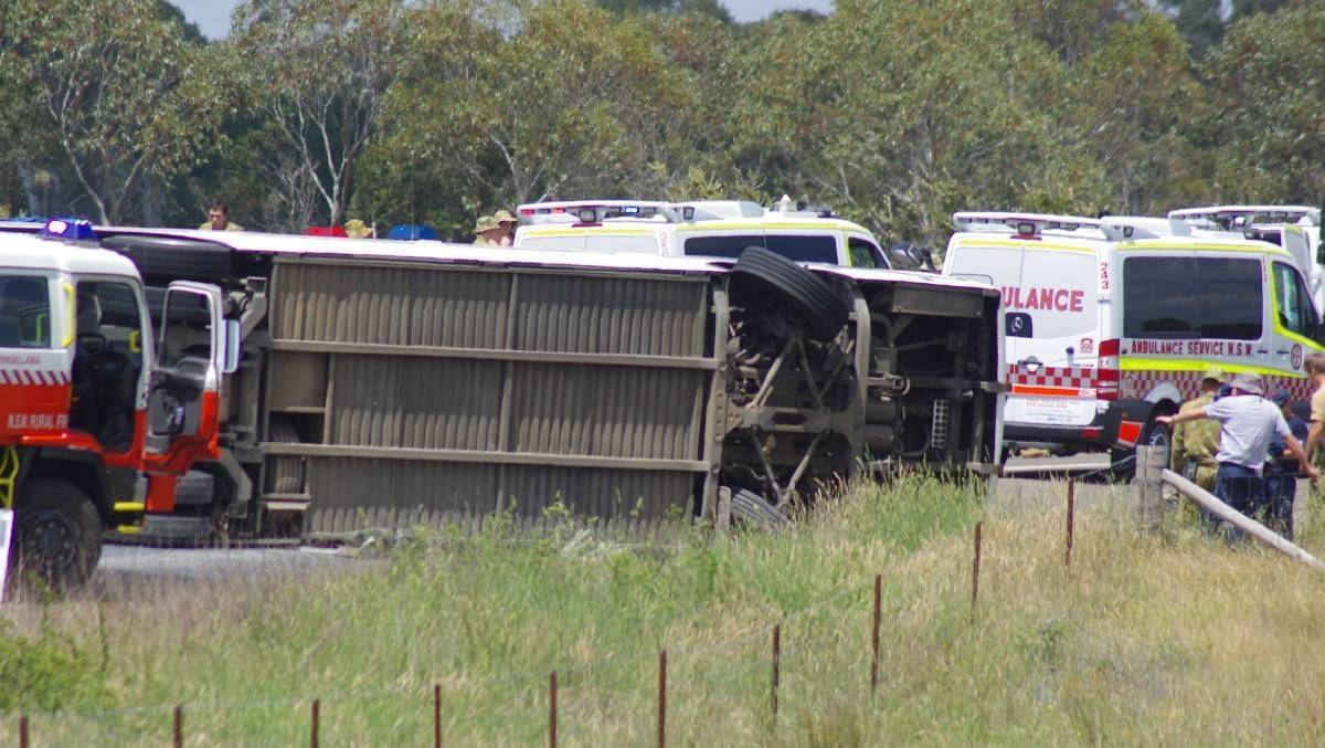 The bus rolled on to its side on Sandy Point Road at Windellama. Photo: Goulburn Post