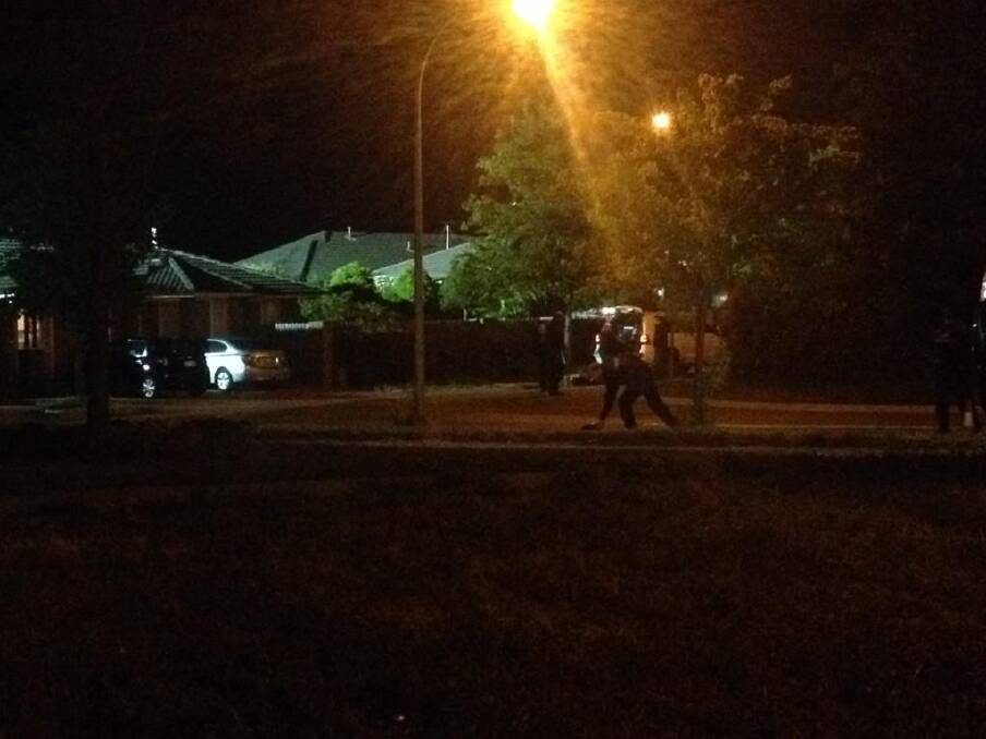 ACT crime: Police examine the area after a suspected murder in Dunlop in 2014.  Photo: Emma Kelly