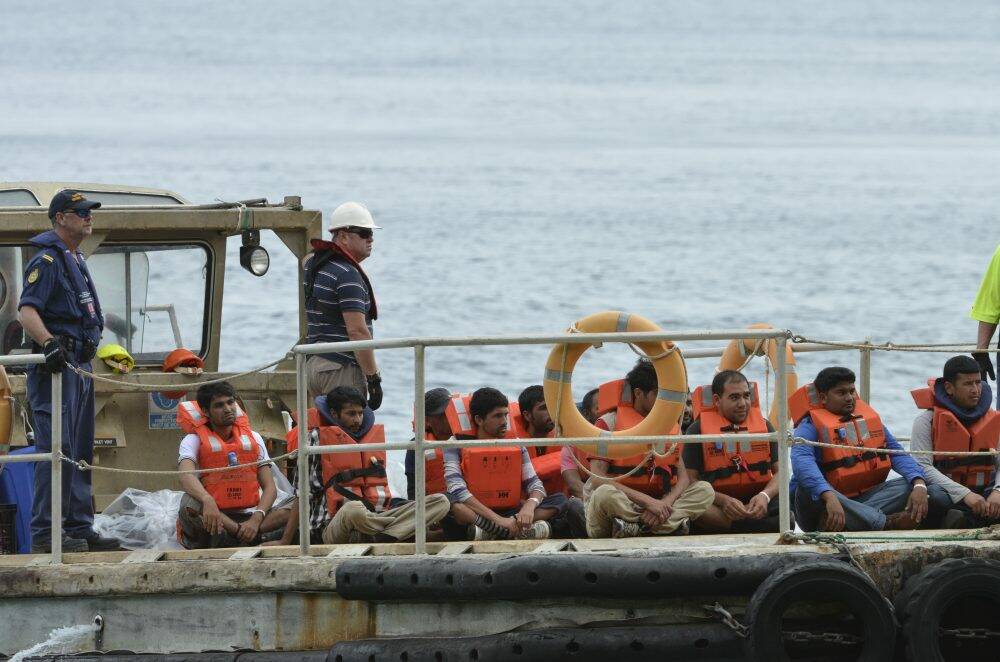 A boat load of asylum seekers arrive on Christmas Island. Photo: Sharon Tisdale