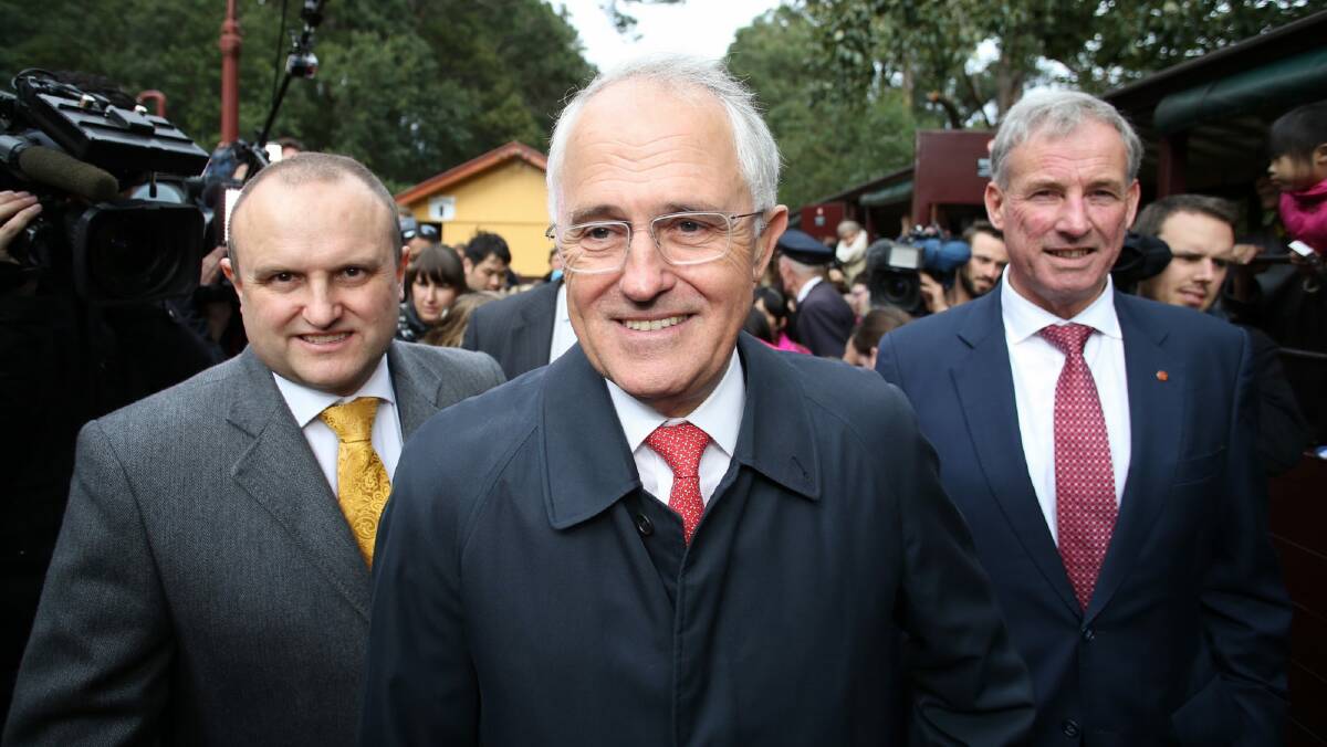Prime Minister Malcolm Turnbull travelled on the Puffing Billy railway with local member Jason Wood and Senator Richard Colbeck on Wednesday. Photo: Andrew Meares