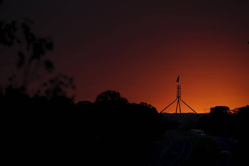 A dramatic sunrise sweeps over Canberra ahead of a dramatic day in national politics.  Photo: Alex Ellinghausen