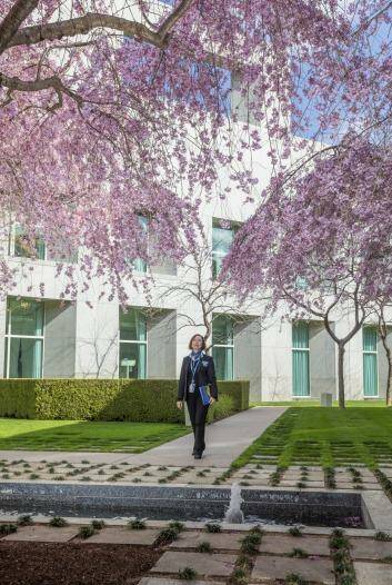 Guide Rosie Bruce in one of the courtyards of Parliament House. Photo: Matt Bedford