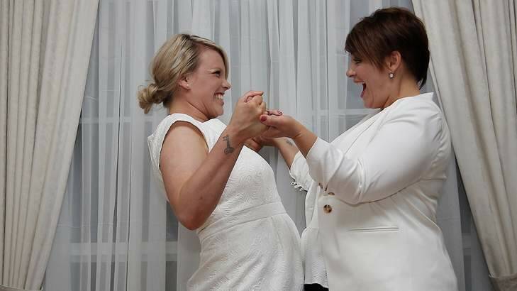 Ashleigh Watson and Narell Majic get married at their home, in Canberra on Tuesday.