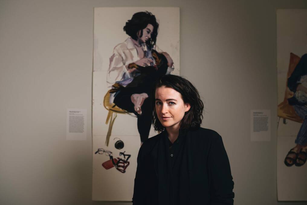 Megan Washington with the portrait of her by artist Nicholas Harding. Photo: Rohan Thomson