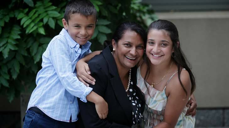 Nova Peris with her children Jack (left) and Destiny (right), at Parliament House in Canberra on Tuesday. Photo: Alex Ellinghausen