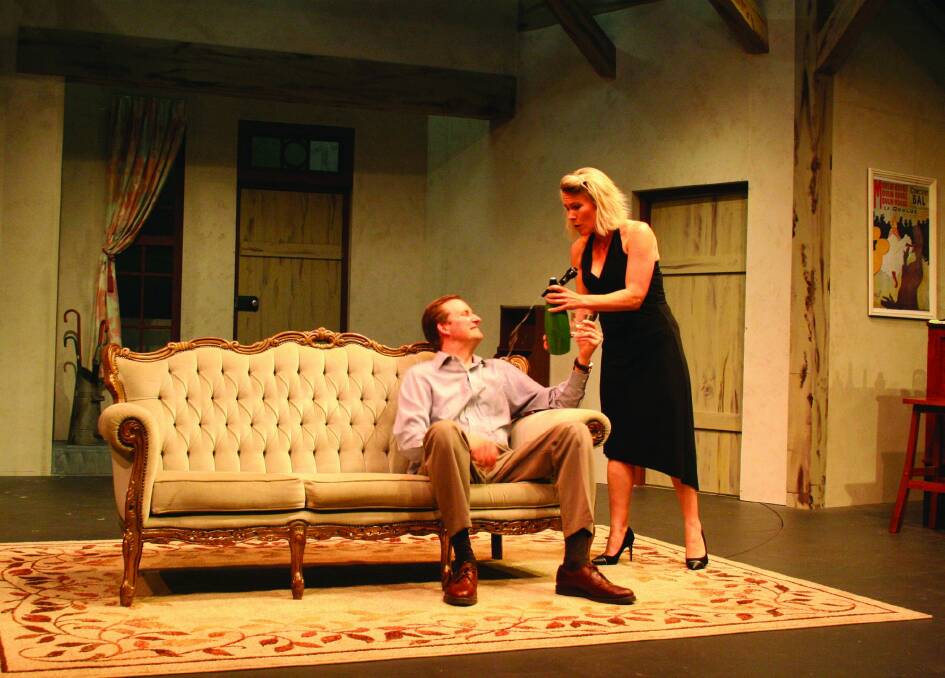 Peter Holland is a philandering husband and Monique Dyson his wife in Don't Dress for Dinner. Photo: Helen Drum