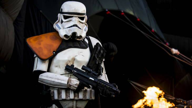 Stormtrooper, Vincent McGann, guards the entrance to the Darth Vader balloon. Photo: Rohan Thomson